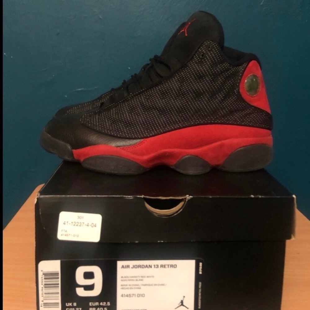 Jordan 13s in the black & red color way. Used